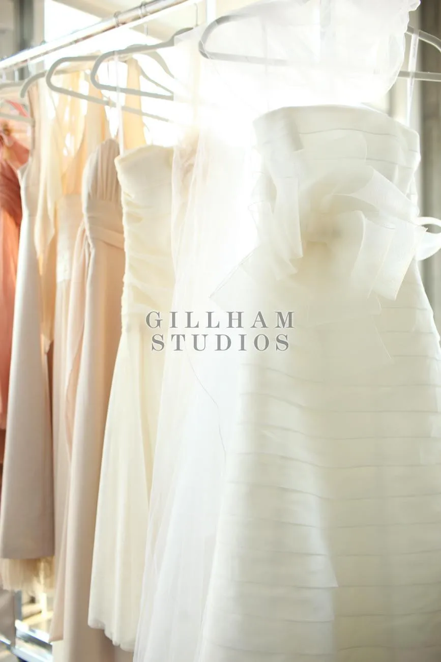 Elegant wedding dresses hanging in a row